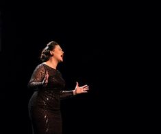 Soprano Tracy Cantin singing with emotional intensity